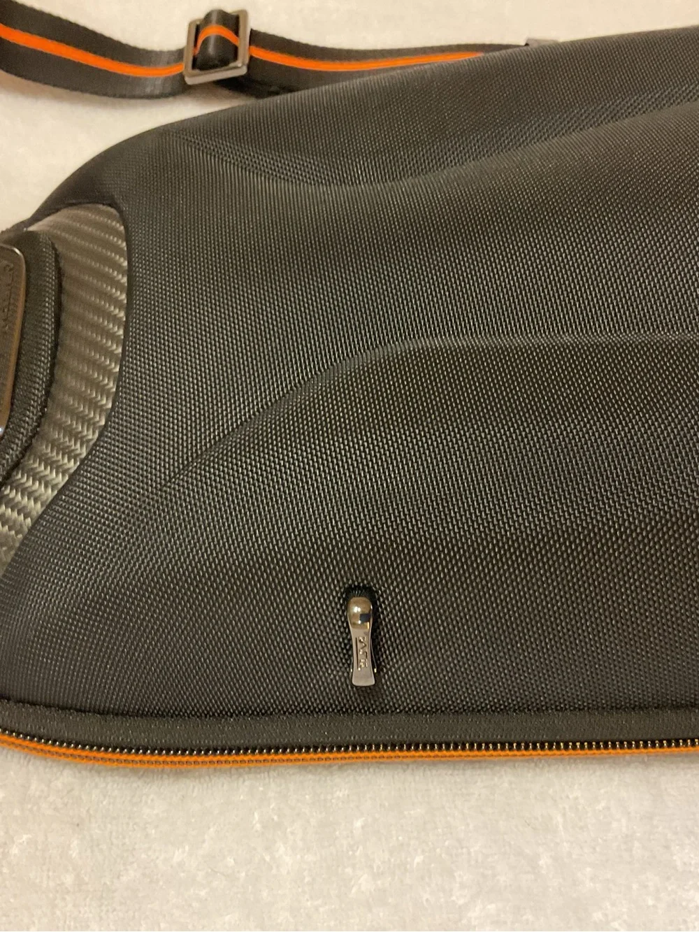 Tumi McLaren Black Sling Belt Bag with Orange Stripe